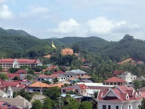 Luang Namtha City in northern Laos, featuring Mekong River views and traditional Lao architecture