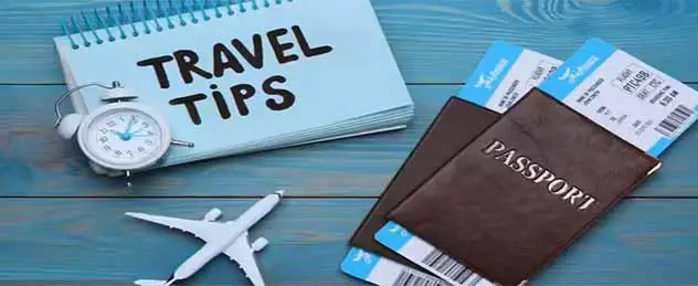Traveler planning a route across Laos with a map and camera